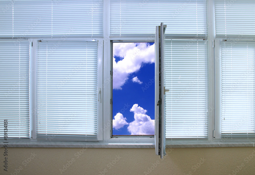 Sky view through an open window in room Sky view through an open window in room