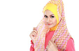 Fashion portrait of young beautiful muslim woman with pink costu