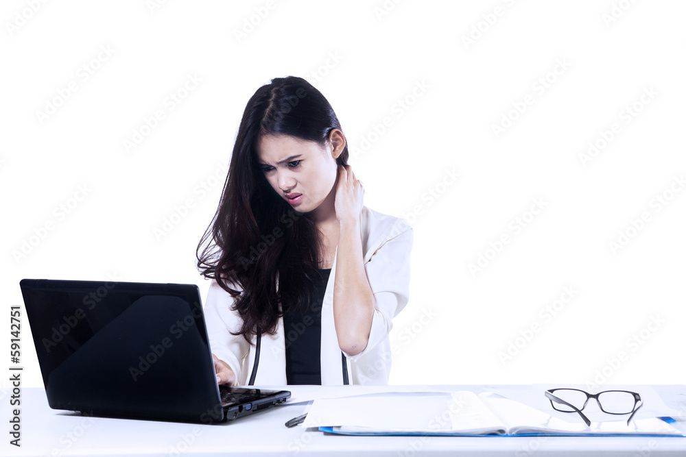 Businesswoman depressed looking at laptop Businesswoman depressed looking at laptop