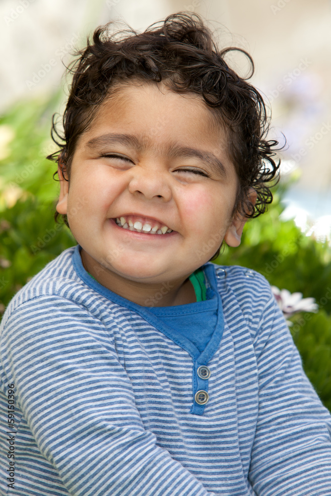 portrait of a cheerful toddler outdoors portrait of a cheerful toddler outdoors