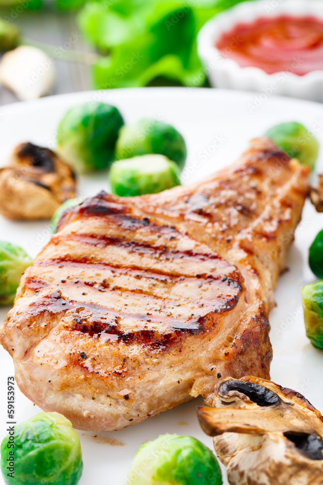 Grilled pork chop with brussels sprouts
