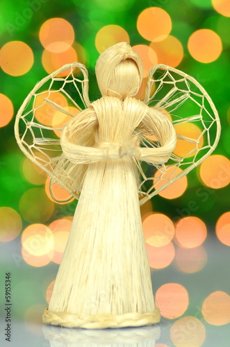 dekoracja bożonarodzeniowa, figurka aniołka na tle bokeh photo