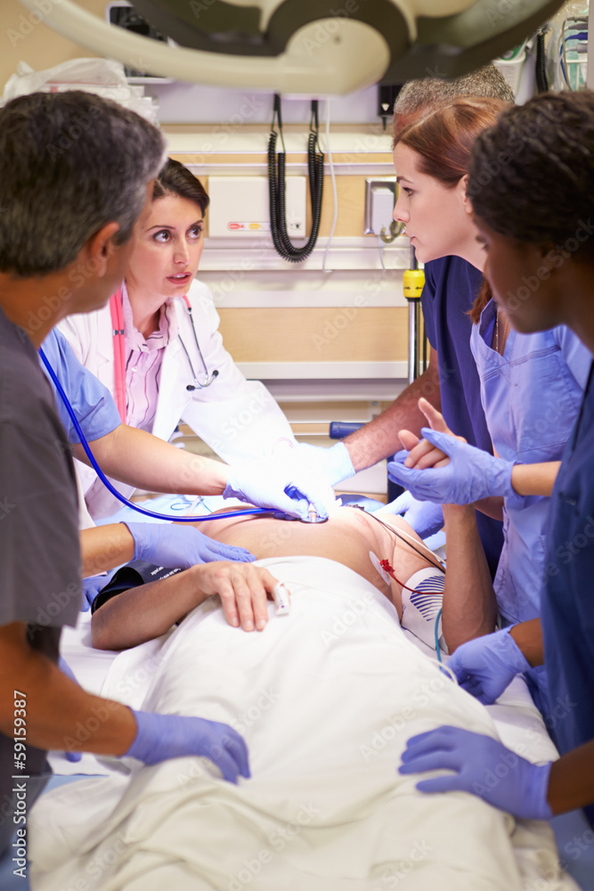 Fototapeta premium Medical Team Working On Patient In Emergency Room
