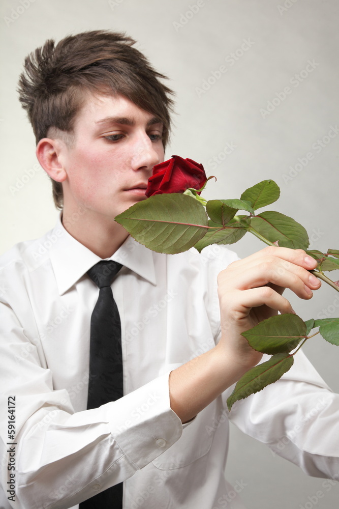 Portrait young man and rose enamoured love Portrait young man and rose enamoured love