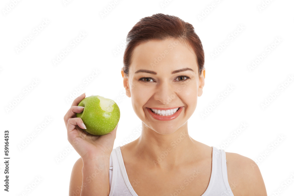 Beautiful woman eating an apple. Beautiful woman eating an apple.