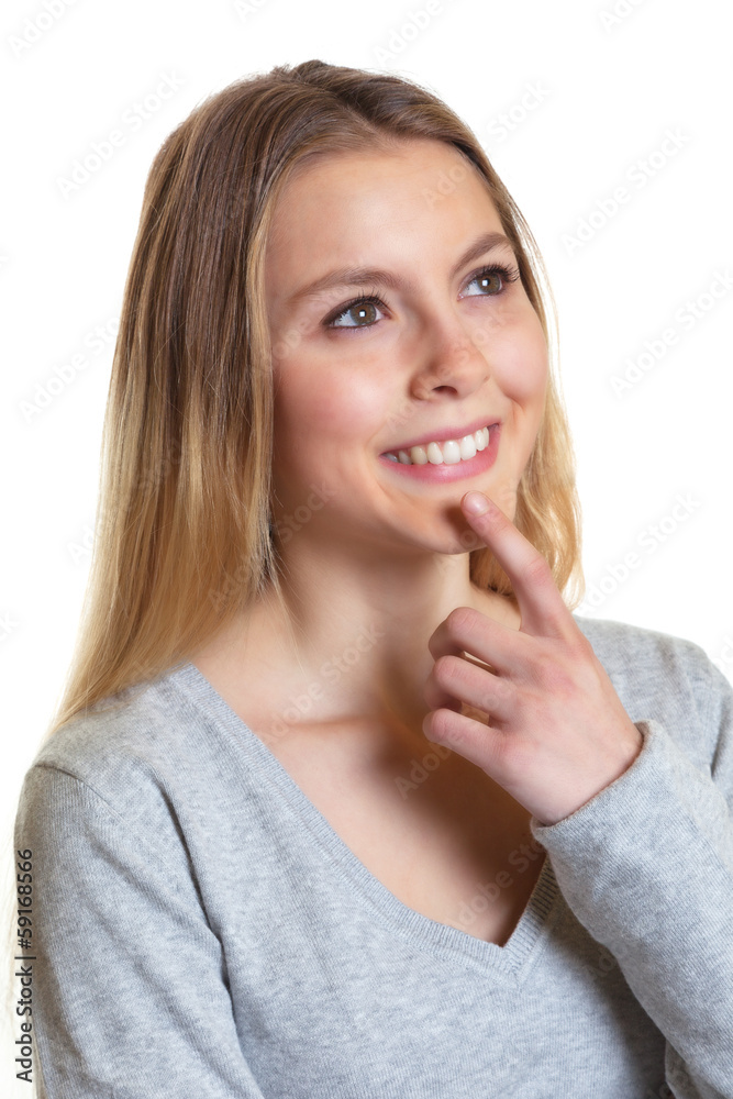 Junge Frau im grauen Pulli hat eine Idee Junge Frau im grauen Pulli hat eine Idee