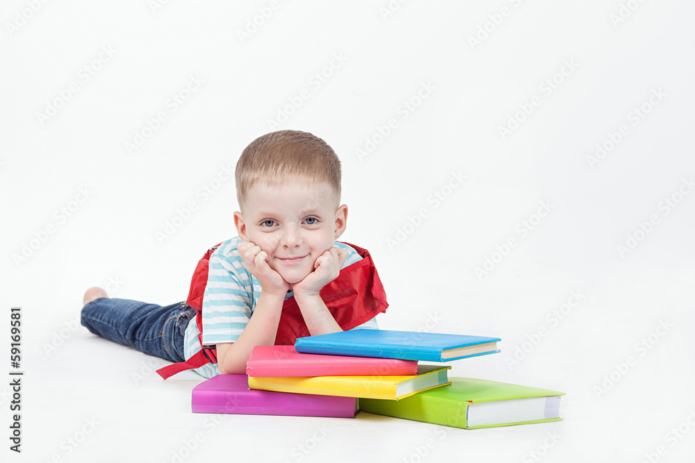 Boy and books isolated on a white background Boy and books isolated on a white background
