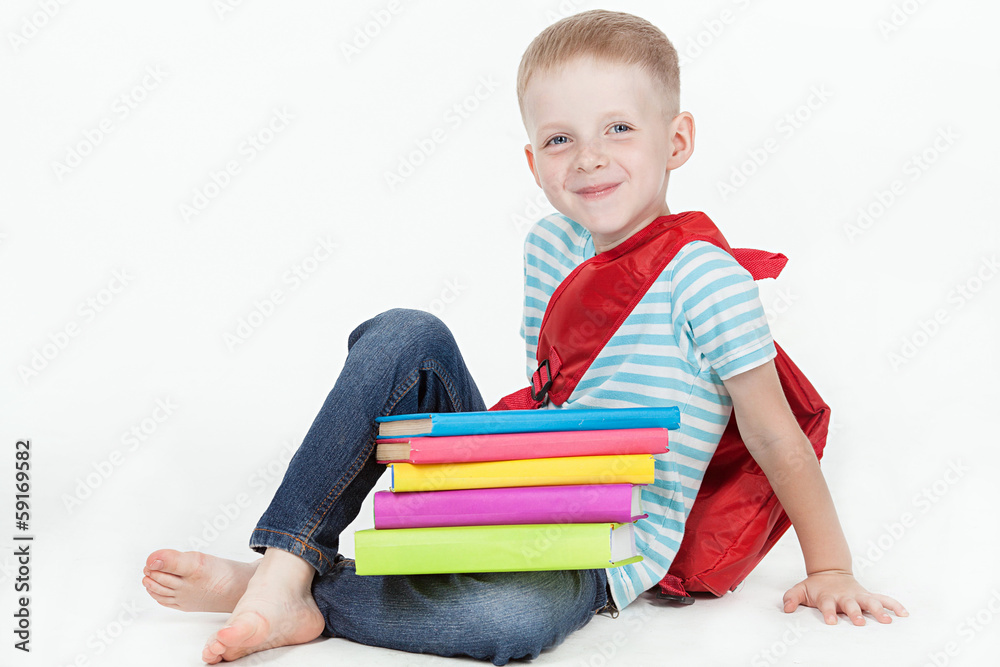 Boy and books isolated on a white background Boy and books isolated on a white background