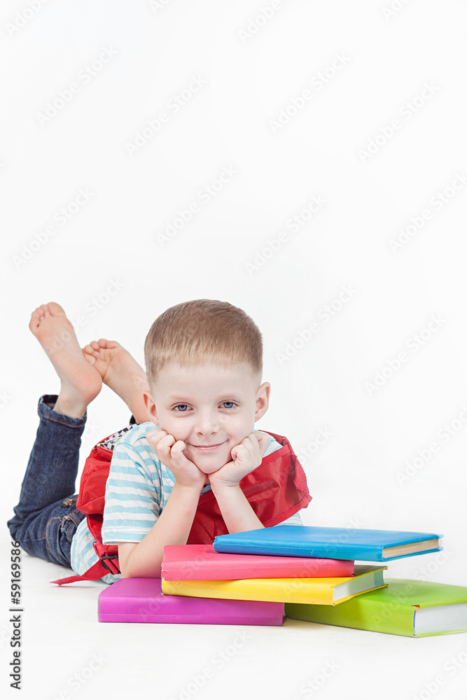 Boy and books isolated on a white background Boy and books isolated on a white background