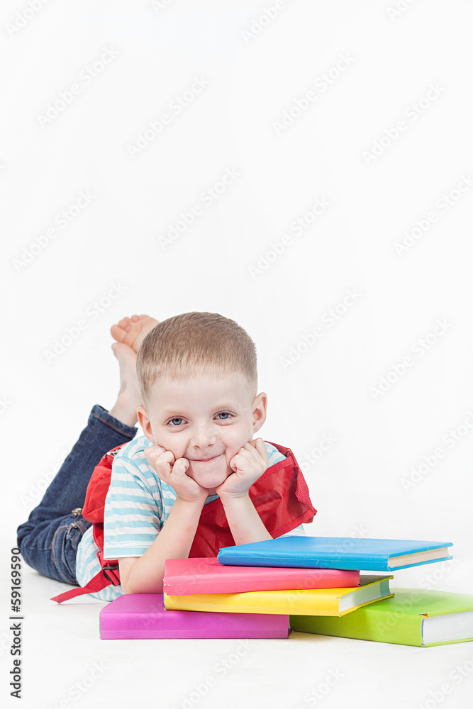 Boy and books isolated on a white background Boy and books isolated on a white background