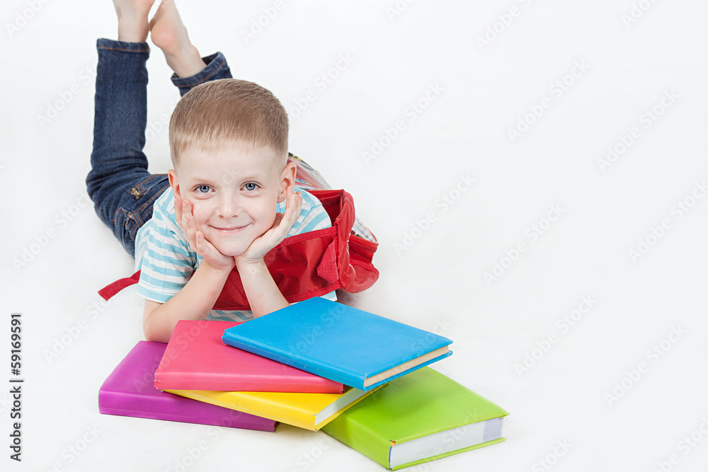 Boy and books isolated on a white background Boy and books isolated on a white background