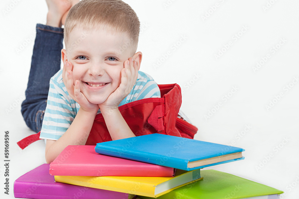 Boy and books isolated on a white background Boy and books isolated on a white background
