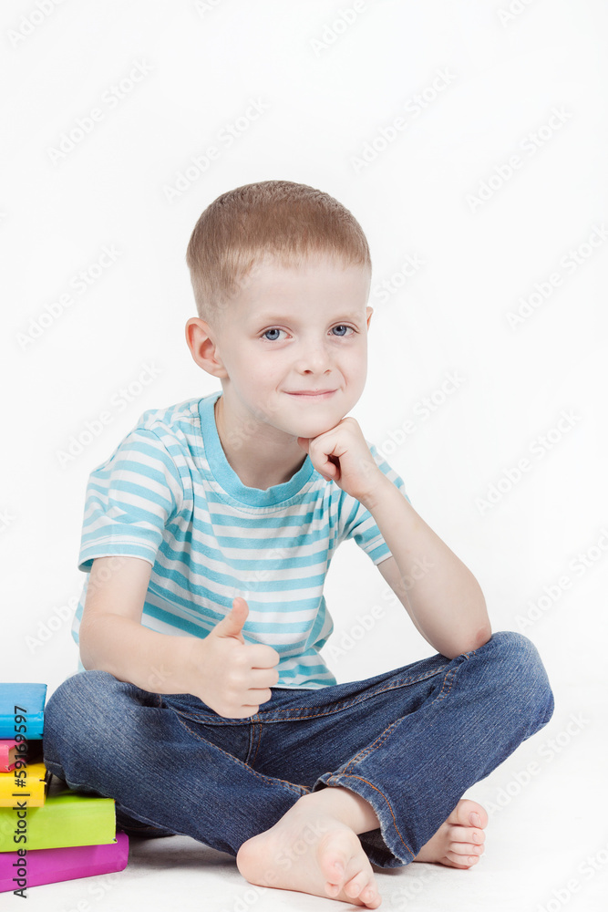 Boy and books isolated on a white background Boy and books isolated on a white background