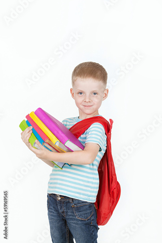 Boy and books isolated on a white background