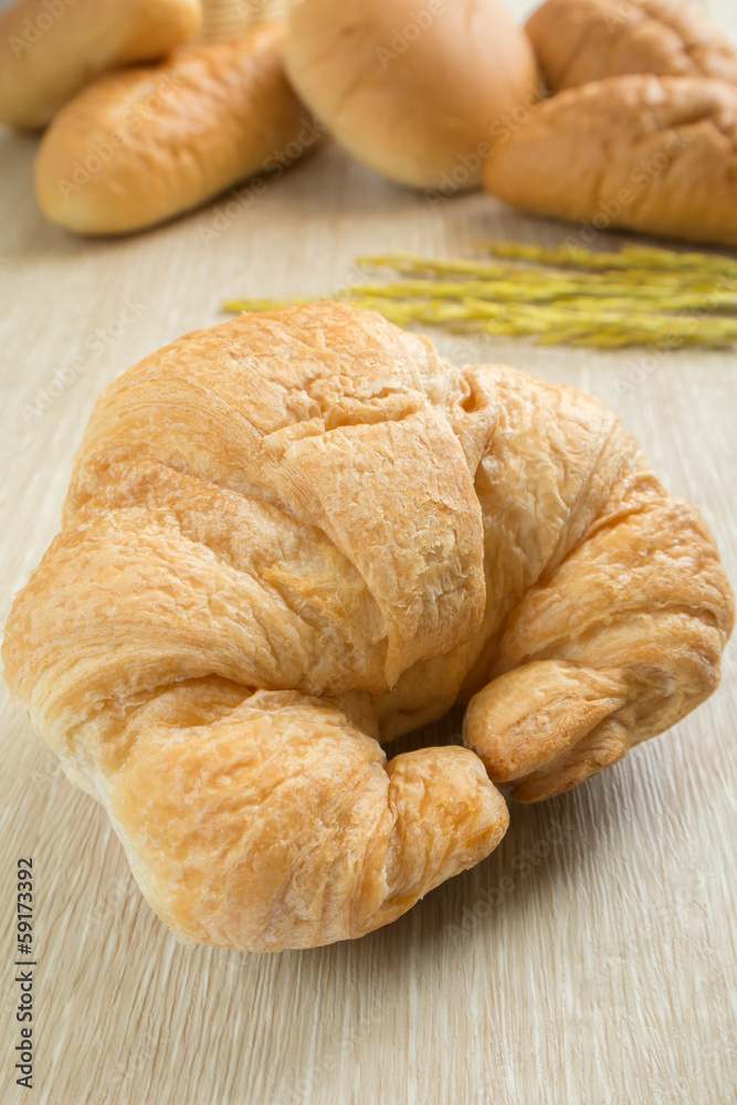 Closeup of fresh croissant with breads