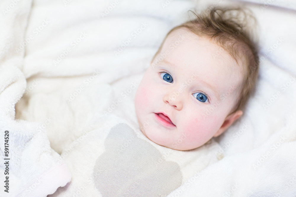 Cute funny little baby wearing a warm knitted sweater Cute funny little baby wearing a warm knitted sweater