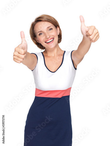 Portrait of a beautiful adult happy woman with thumbs up sign