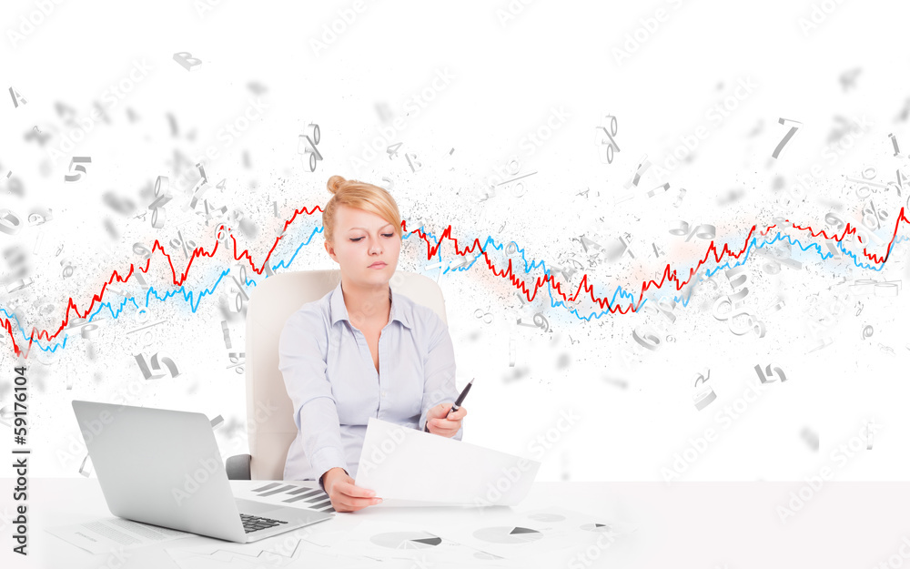 Business woman sitting at table with stock market graph Business woman sitting at table with stock market graph