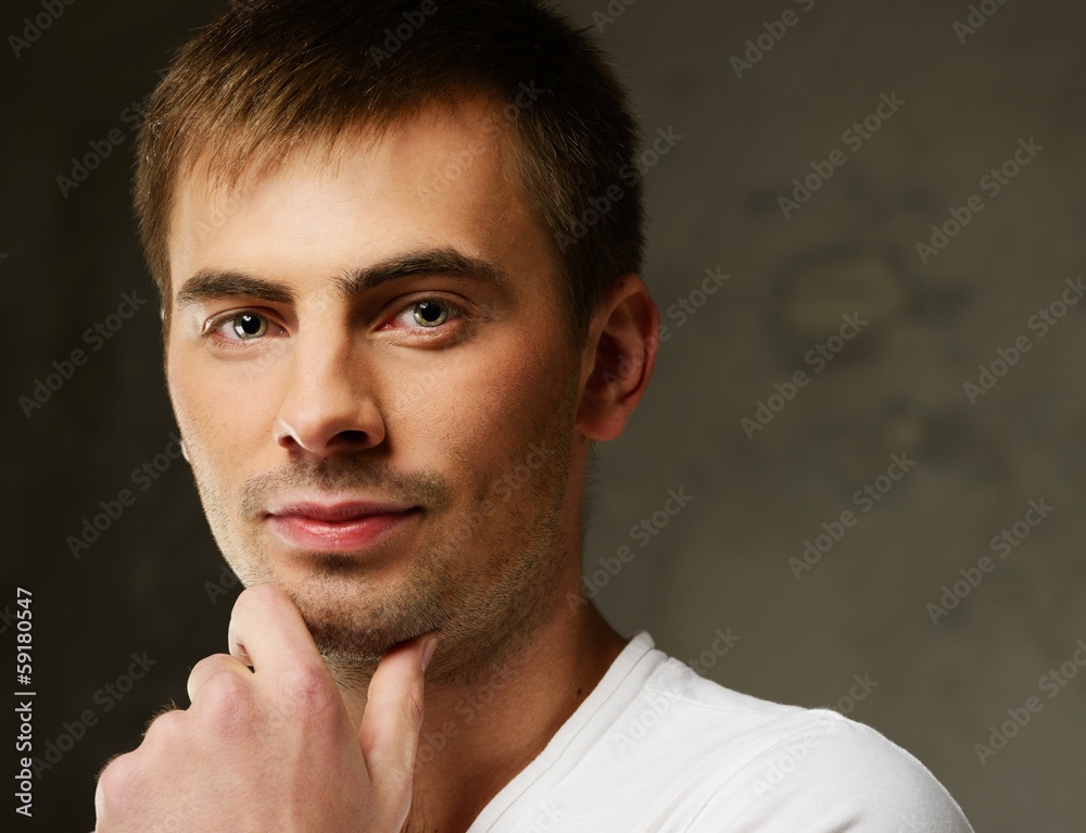 Fototapeta premium Handsome young man close-up shot portrait