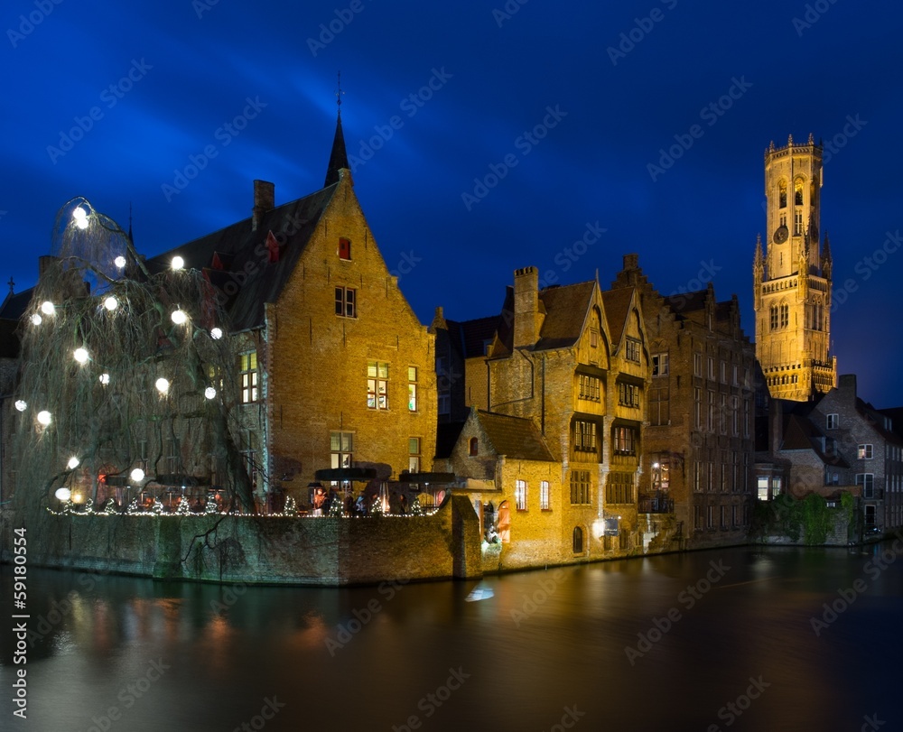 Fototapeta premium View of a decorated quay in Bruges, Belgium