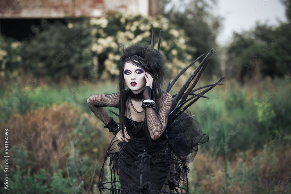 Obraz premium Wicked witch woman in a dark forest