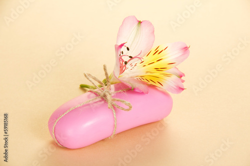 Fragrant toilet soap with a rope and flower
