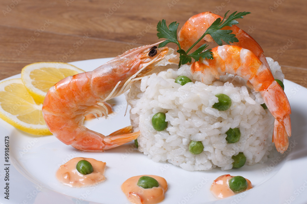 risotto with seafood on wooden table risotto with seafood on wooden table