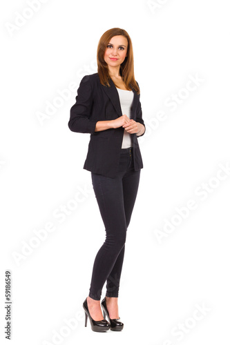 Confident businesswoman standing.