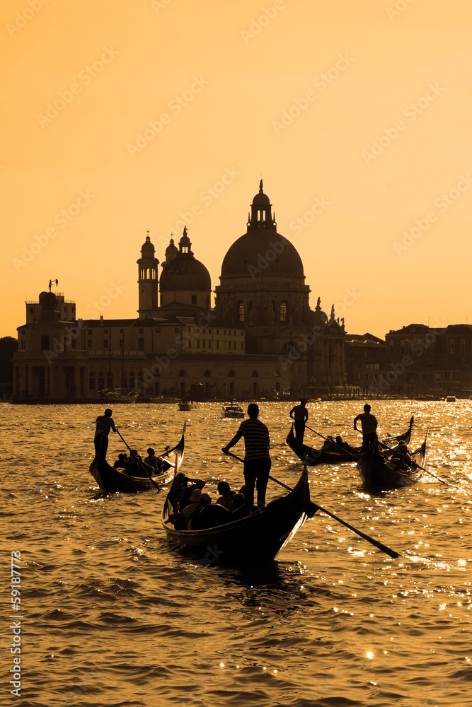 Gondolas on the canals of Venice at night, Italy