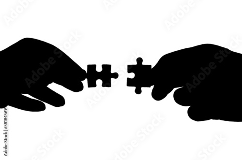 hand and puzzle isolated on white background