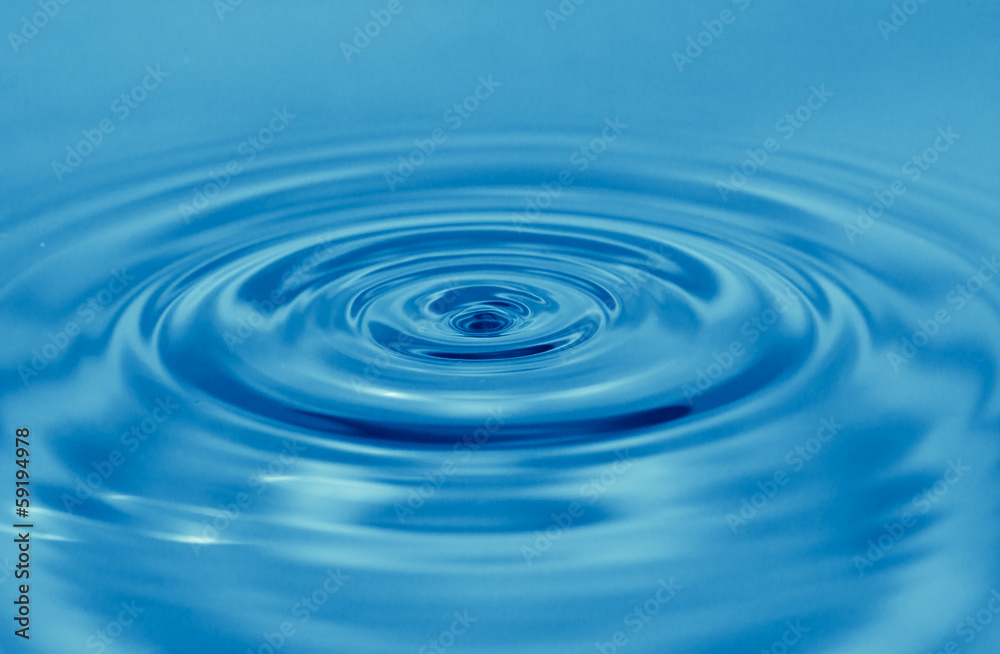 a drop of water falls in the blue. macro... a drop of water falls in the blue. macro...