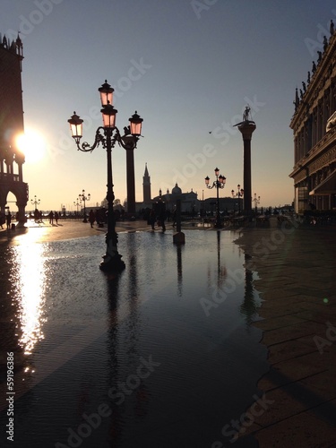San Marco square at sunrise with high water in Venice © Yevgenia Gorbulsky