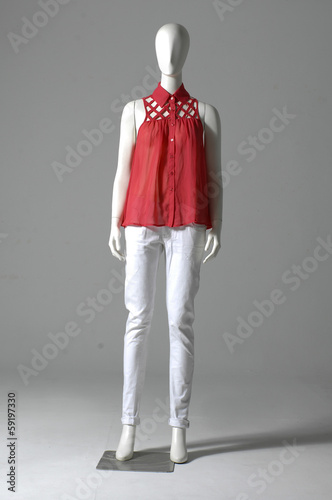 Mannequin dressed in red shirt and trousers