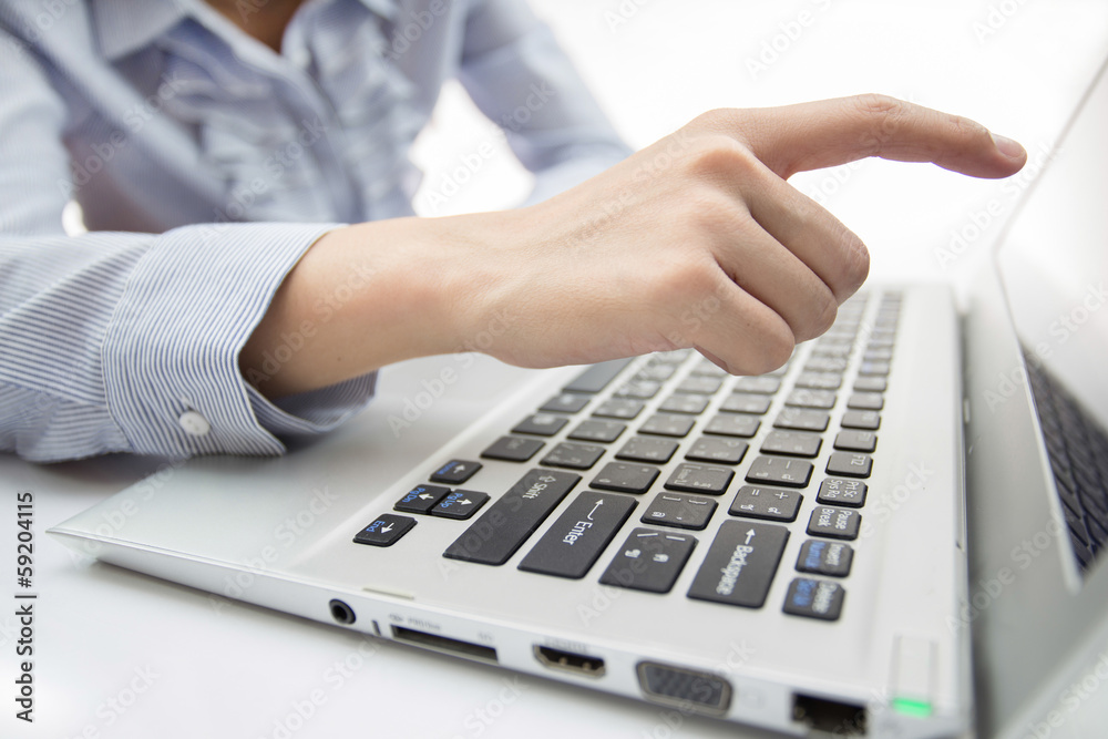 Hands of business woman with laptop computer Hands of business woman with laptop computer