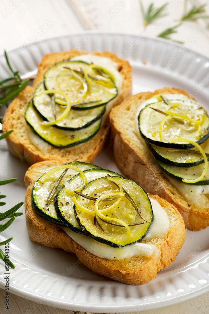 Bruschetta with stewed zucchini, mozzarella and rosemary Bruschetta with stewed zucchini, mozzarella and rosemary