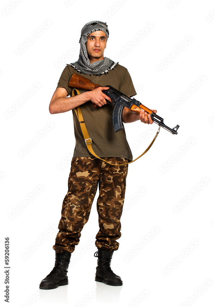 Arab nationality in camouflage suit and keffiyeh with automatic Arab nationality in camouflage suit and keffiyeh with automatic