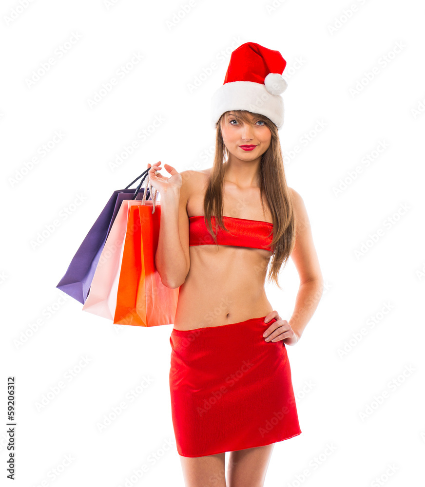 Beautiful Santa christmas girl with shopping bags on white Beautiful Santa christmas girl with shopping bags on white