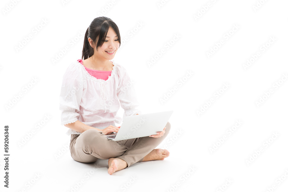 young asian woman using laptop on white background young asian woman using laptop on white background