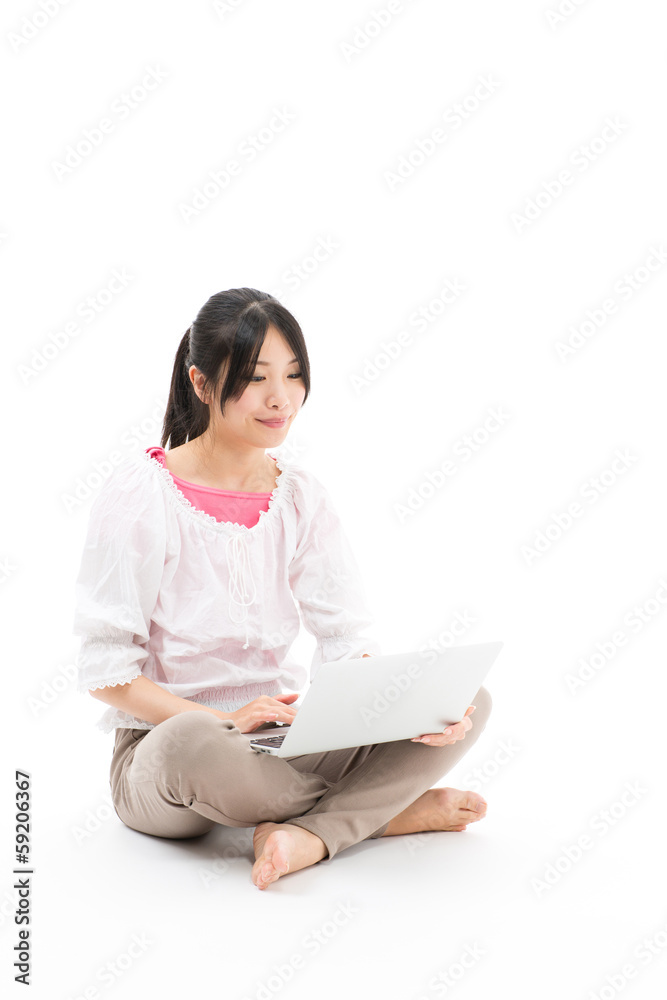 young asian woman using laptop on white background young asian woman using laptop on white background
