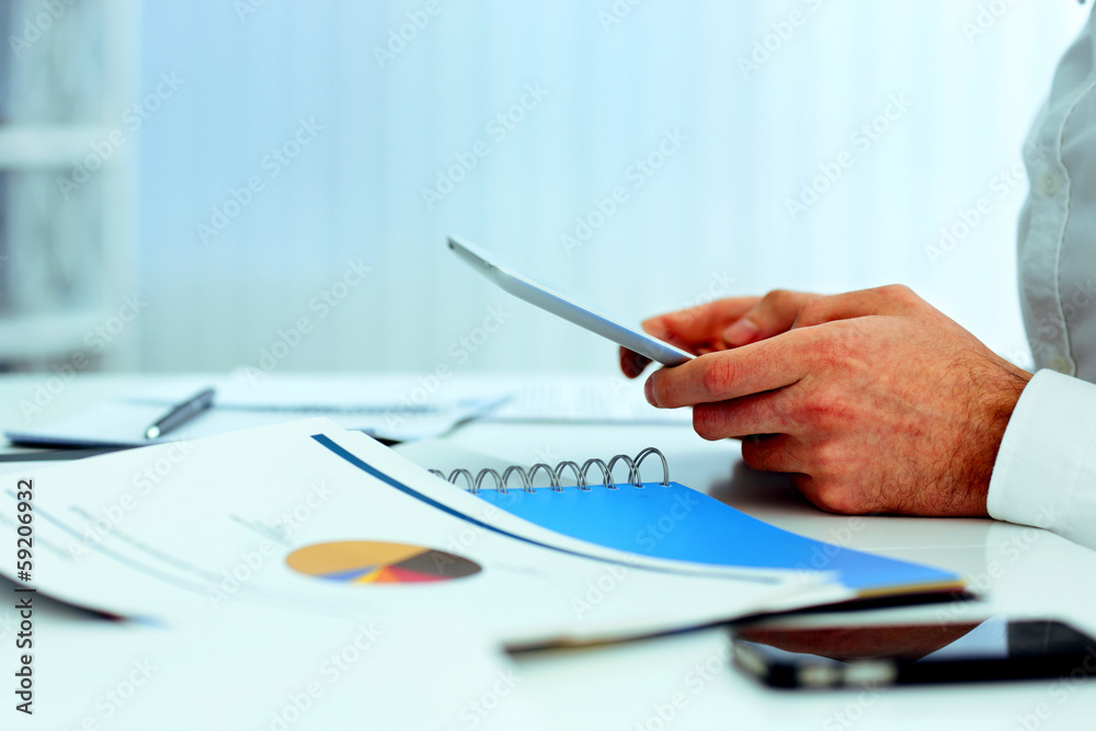 Businessman holding tablet computer