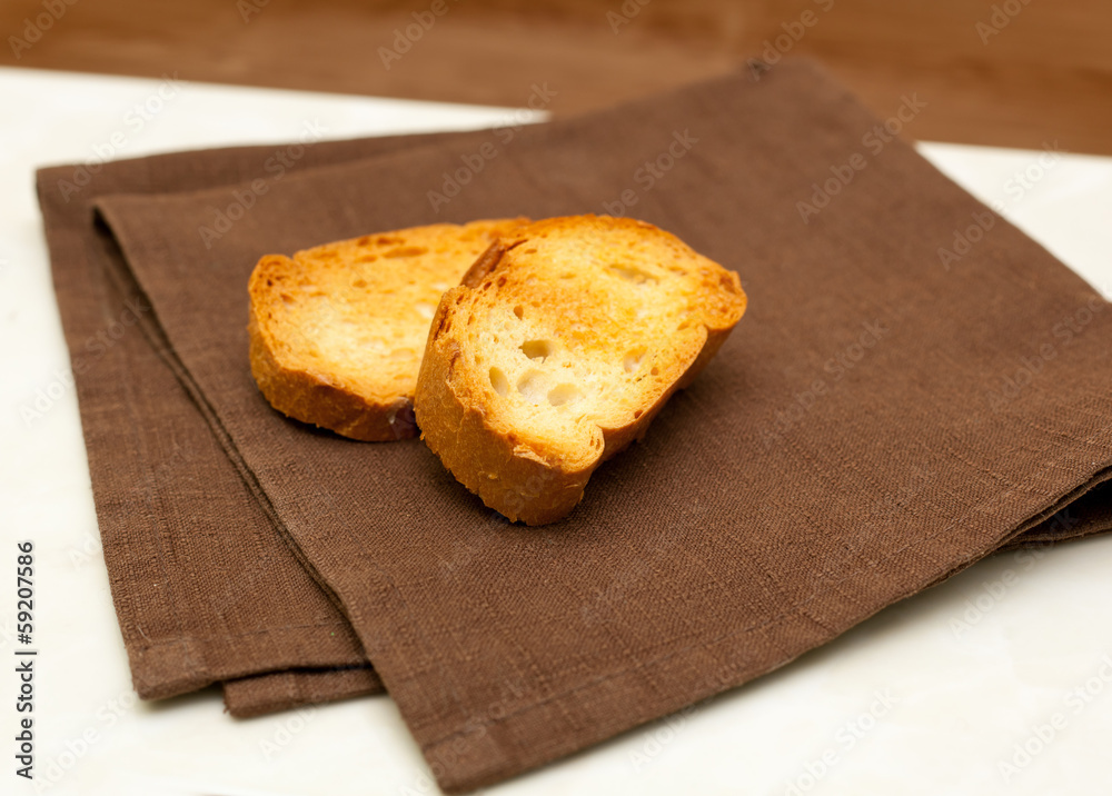 slice of grilled baguette slice of grilled baguette