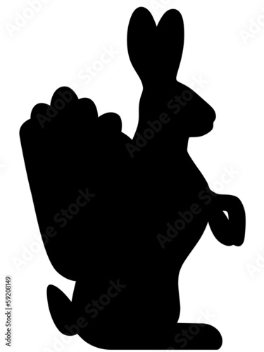 Schwarze Silhouette Osterhase mit Eierkorb - Vektor/freigestellt