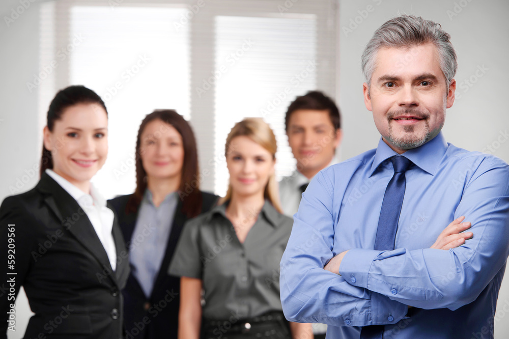 businessman looking successful with crossed arms. businessman looking successful with crossed arms.