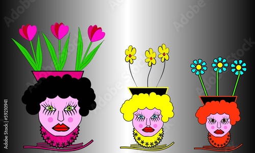 Maceteros con caras de mujer.
