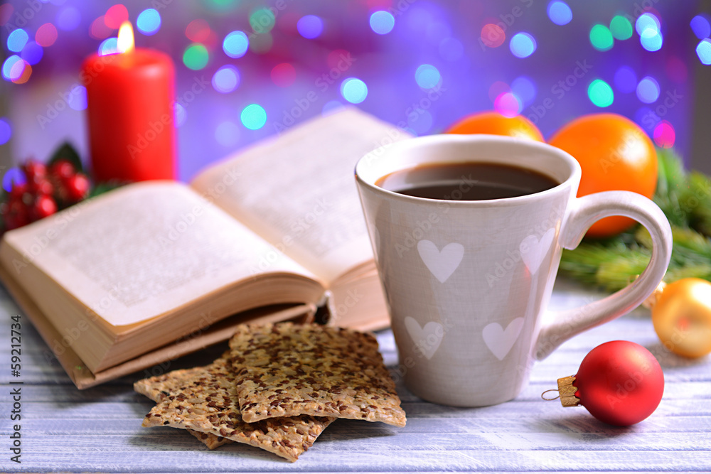 Composition of book with cup of coffee and Christmas Composition of book with cup of coffee and Christmas