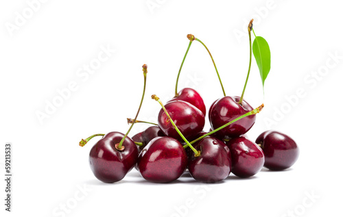 Close up of heap of cherry, isolated on white
