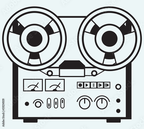 Reel tape recorder isolated on blue background