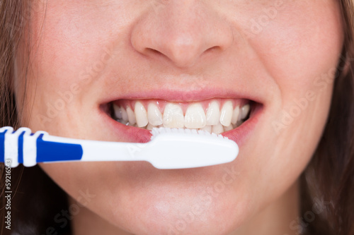 Woman Brushing Teeth