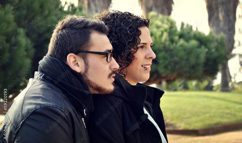 Fototapeta premium Young couple in a park