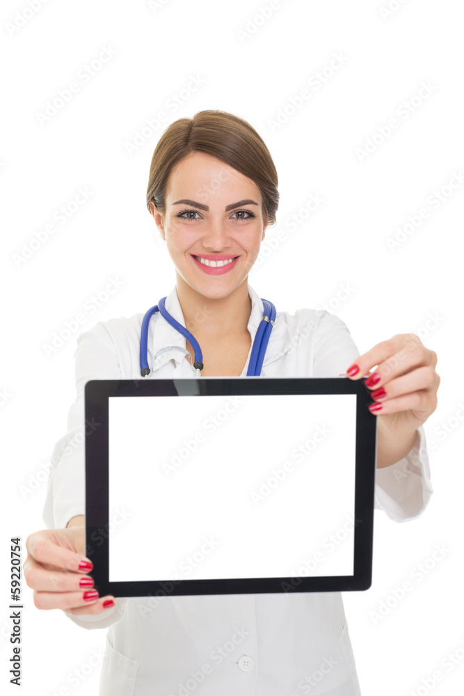 Confident female doctor smiling showing tablet computer Confident female doctor smiling showing tablet computer